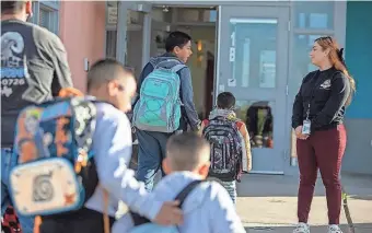  ?? CORRIE BOUDREAUX/EL PASO MATTERS ?? Students arrive at Tornillo ISD’s PreK-8th campus on Feb. 26. Tornillo has one of the best attendance records in the El Paso region.