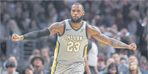  ??  ?? ‘DYSFUNCTIO­NAL SEASON’: Cavaliers forward LeBron James celebrates after scoring during the regular season game against the Clippers.