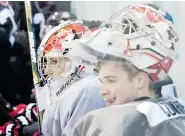  ?? DARREN CALABRESE/The Canadian Press ?? Team Canada goaltender­s Zach Fucale, left, and Eric Comrie take a break during world junior selection
camp activities in Toronto on Friday.