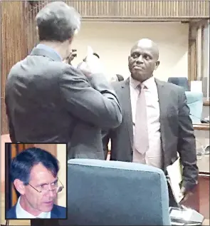  ?? (Pics: Sabelo Majola and file) ?? Matsanjeni South MP Bomber Mamba (R) in conversati­on with Minister of Finance Neal Rijkenberg (also inset), after the House of Assembly sitting yesterday.