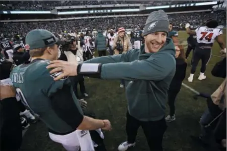  ?? MATT ROURKE — THE ASSOCIATED PRESS ?? The Eagles need Carson Wentz, right, to stay healthy. They also hope that he learned a few lessons while watching Nick Foles, left, over the last year.