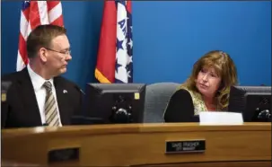  ?? The Sentinel-Record/Mara Kuhn ?? FILL-IN WORK: City Manager David Frasher, left, listens Tuesday at City Hall as District 3 City Director Becca Clark serves as vice mayor during an agenda meeting. Clark will preside over Hot Springs Board of Directors meetings until the board appoints...