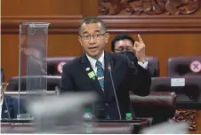  ?? — Bernama photo ?? Dr Noor Azmi giving his reply in the Dewan Negara to Ahmad Azam’s question.