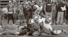  ?? Photo contribute­d by Gail Conner ?? The Cedartown defense stands up to Sandy Creek in the second half.