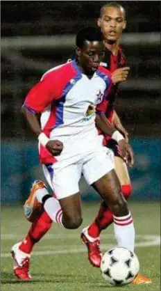  ?? ?? Catch me if you can... Masinga waltzes past Black Africa’s Brian Bantam.