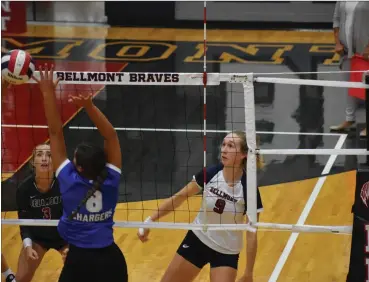  ?? ?? Delaney Lawson (right) sends the ball over the net for the Bellmont Braves.*