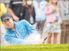  ?? Stephen B. Morton The Associated Press ?? Stewart Cink hits out of a bunker to the 15th green Friday in the second round of the RBC Heritage at Harbour Town Golf Links.