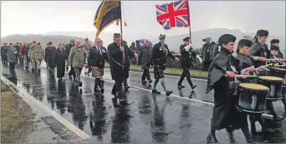  ?? IF F46 Remembranc­e Lochalsh 02. ?? A large procession marched to the Lochalsh War Memorial on Sunday.