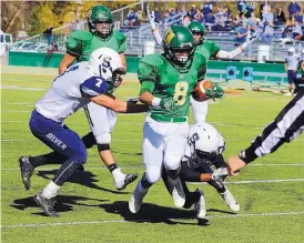  ?? COURTESY OF SHANNON STEVEN ARAGON ?? The Silver Colts, shown here playing defense against West Las Vegas, will compete in a Class 5A district but are a Class 4A school for playoff purposes.