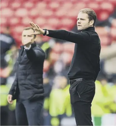  ?? ?? 0 Hearts manager Robbie Neilson got the better of Shaun Maloney in back-to-back derbies