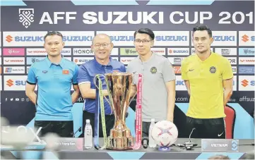  ?? — Bernama photo ?? (From left) Vietnam captain Nguyen Prong Hoang, coach Park Hang Seo, Tan Cheng Ho and Mohamad Zaquan Adha Abd Radzak during a press conference at National Stadium, Bukit Jalil.