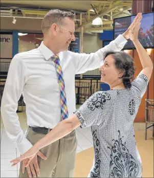  ?? DAVE STEWART/THE GUARDIAN ?? Rod and Laura Weatherbie are giving west coast swing dance lessons every Wednesday at Confederat­ion Court Mall in Charlottet­own. The lessons, which are free, take place in the central part of the food court from 12:05 to 12:50 p.m.