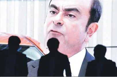  ?? Toshifumi Kitamura/AFP ?? Carlos Ghosn conseguiu grande admiração no Japão, por ter transforma­do um grupo à beira da falência em uma empresa lucrativa