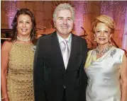  ??  ?? Regina Garcia, left, Steve Tyrell and Philamena Baird