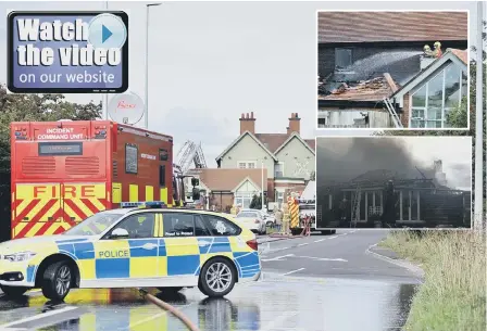  ??  ?? Emergency vehicles attend the blaze at the Mill House in Springwell, near Washington, yesterday. Inset, the building engulfed in smoke.