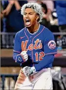  ?? Jessie Alcheh / Associated Press ?? Francisco Lindor of the Mets reacts after hitting a two-run triple in the fifth inning against the Phillies at Citi Field.