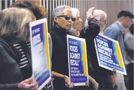  ?? Paul Chinn / The Chronicle ?? Retired Santa Clara County Superior Court Judge LaDoris Cordell (center) joined volunteers to protest the recall initiative.