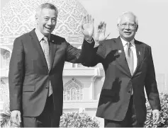  ??  ?? Najib and Lee officially opened the Marina One and DUO projects worth S$11 billion (RM32.9 billion). — Reuters pic