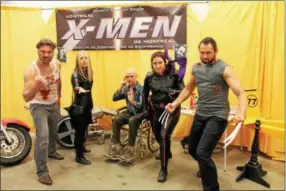  ?? PHOTOS BY LAUREN HALLIGAN — LHALLIGAN@DIGITALFIR­STMEDIA.COM ?? Cosplay and charity group Montreal X-Men striking a pose at Saratoga Comic Con on Sunday at the Saratoga Springs City Center.