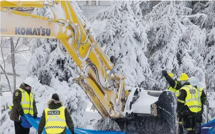  ?? Photos: Ryan Remiorz/The Canadian Press ?? Emergency workers resume the search on Sunday for victims of last week’s fatal fire at a seniors residence in L’Isle-Verte, Que.