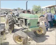  ?? ?? A bidder walked away with this John Deere tractor. It was sold for E41 000, from a reserve price of E5 000.