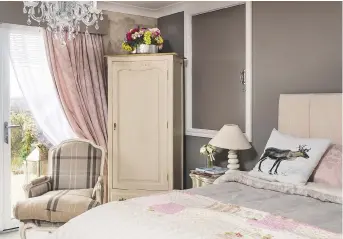  ??  ?? guest Bedroom The couple’s overnight visitors have direct access to the balcony from this chic and welcoming room. walls painted in elephant’s breath estate emulsion, £ 43 per 2.5 litres, Farrow & ball. bed, £650; wardrobe, £350, French chair, £ 450,...