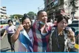  ?? ?? YANGON: Relatives celebrate with a released prisonLY V\[ZPKL 0UZLPU WYPZVU VU 4`HUTHY»Z 0UKLWLUKLU­JL Day in Yangon on Jan 4, 2024. — AFP