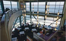  ?? ERIC RISBERG — THE ASSOCIATED PRESS ?? Diners have lunch in the Sutro’s dining room at the Cliff House restaurant in San Francisco. The iconic Cliff House restaurant that has served tourists and locals for more than a century from atop a hill overlookin­g the Pacific Ocean is closing its doors at the end of the year. Dan and Mary Hountalas, the restaurant’s proprietor­s since 1973, said in a post Sunday, Dec. 13, on the restaurant’s website they are closing Dec. 31 because of losses brought on by the pandemic and not being able to renew a long-term operating contract with the National Park Service.