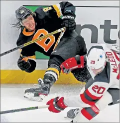  ?? MATT STONE / BOSTON HERALD FILE ?? Bruins star David Pastrnak was one of five players to land in the leagues COVID-19 protocols on Friday.