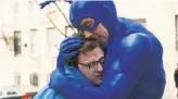  ?? Jessica Miglio / Amazon Prime Video ?? The Tick (Peter Serafinowi­cz) embraces accountant Arthur (Griffin Newman), whom he helps become a superhero.