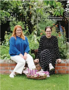  ??  ?? ABOVE Tonia and Julia pictured in Julia's beautiful backyard, the creation of which has inspired Julia to share her knowledge in her first book. Image supplied.