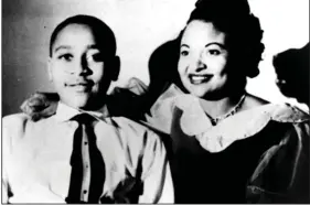  ?? (AP/Mamie Till Mobley Family, File) ?? This undated family handout photograph taken in Chicago shows Mamie Till Mobley and her son Emmett Till, whose lynching in 1955 became a catalyst for the civil rights movement.