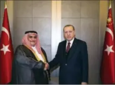  ?? YASIN BULBUL/PRESS PRESIDENCY PRESS SERVICE VIA AP, POOL ?? Turkey’s President Recep Tayyip Erdogan, right, shakes hands with Bahrain’s Foreign Minister Sheik Khalid bin Ahmed Al Khalifa prior to their meeting in Istanbul, Saturday. Turkish President Recep Tayyip Erdogan reaffirmed his backing for Qatar in its...