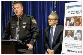  ?? AP ?? Pike County Sheriff Charles Reader (left) discusses the investigat­ion into the unsolved killings of eight family members in southern Ohio on April 22, 2016, at a news conference attended by Attorney General Mike DeWine, whose office is leading the...
