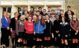  ?? SUBMITTED PHOTO ?? St. James Regional Catholic School principal Barbara Burke, third from left, is pictured with the school’s eighth-grade students during a recent visit to Neumann University in Aston. St. James and Neumann recently formed a profession­al partnershi­p.