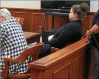  ?? PATRICIA DOXSEY — DAILY FREEMAN ?? Sarra Gilbert waits for the jury to announce its verdict Thursday in Ulster County Court. At left is her attorney, John Ray.