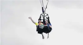  ?? /FUN SPOT AMERICA ?? Sky Sled lets riders prop up their feet before the dramatic freefall of about 100 feet.