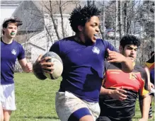  ?? ?? Raytrell Allison moved the ball up the pitch for Avon View during their match against Horton. AV defeated Horton April 22 with a score of 20-12.