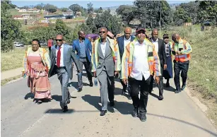  ??  ?? PAVING THE WAY: Eastern Cape Premier Phumulo Masualle took in Ngqeleni and Libode inspecting infrastruc­ture projects undertaken by the provincial government together with Nyandeni municipal bosses as part of the revitalisa­tion programme.