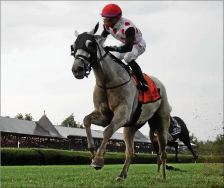  ?? PHOTO NYRA/JAMIE COULTER ?? World Approval with Manny Franco up captured the 2017 running of the Fourstarda­ve at Saratoga Race Course on Saturday.