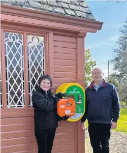  ?? ?? Lifesaver Hilary Mackenzie from St John Scotland, Perth and Kinross with Rev Stephen Blakey, Isla Parishes minister