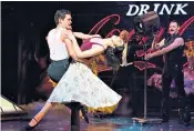  ??  ?? Lithe choreograp­hy: Zizi Strallen as Fran, Jonny Labey as Scott and Will Young as Wally in Strictly Ballroom: The Musical