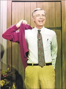  ?? Associated Press ?? This June 8, 1993, file photo shows Fred Rogers during a rehearsal for a segment of his television program Mr. Rogers' Neighborho­od in Pittsburgh.