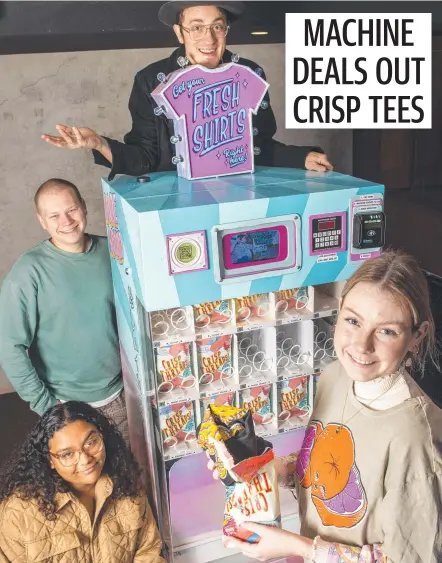  ?? Picture: Nev Madsen. ?? SHIRT SNACK: Showing off the new T-shirt vending machine at the Armitage Centre are (from left) Rare Squid’s Josh Willson, Bindi Wenitong and Paddy Long with artist Ashley Churchward.