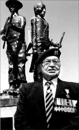  ?? PETER EDWARDS/TORONTO STAR ?? Clifford George, an elder of Kettle and Stony Point band near Sarnia, is seen at the unveiling of a monument to native veterans in June 2003. He died Friday.