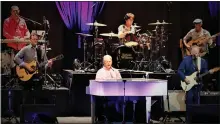  ?? PHOTOS BY RODEO MARIE HANSON ?? Brian Wilson (center) and Al Jardine (right) of The Beach Boys in concert at Santander Performing Arts Center in Reading Oct. 17.