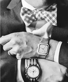  ??  ?? Fillier shows of two watches that he is wearing to WatchTime New York. One if the Vacheron Constantin­e 222 Square and the other an Omega Speedster Italian albino (inverse colour), of which the manufactur­er has only made 500 pieces.
