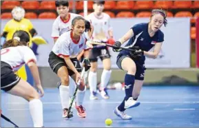  ?? SUPPLIED ?? Cambodian women’s hockey team (white jerseys) playing at Singapore Indoor ASIA Cup 2022 on August 8.