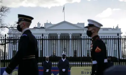  ?? Photograph: Andrew Kelly/Reuters ?? Members from all of the services of the US military march in front of the White House ahead of Joe Biden’s inaugurati­on in Washington DC on 18 January 2021.