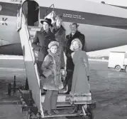  ??  ?? Suzanna Leigh, bottom right, with fellow stars Roger Moore, Peter Mcenery, Hannah Gordon and Sandor Eles at Turnhouse Airport for the opening of Edinburgh’s ABC cinema in 1969